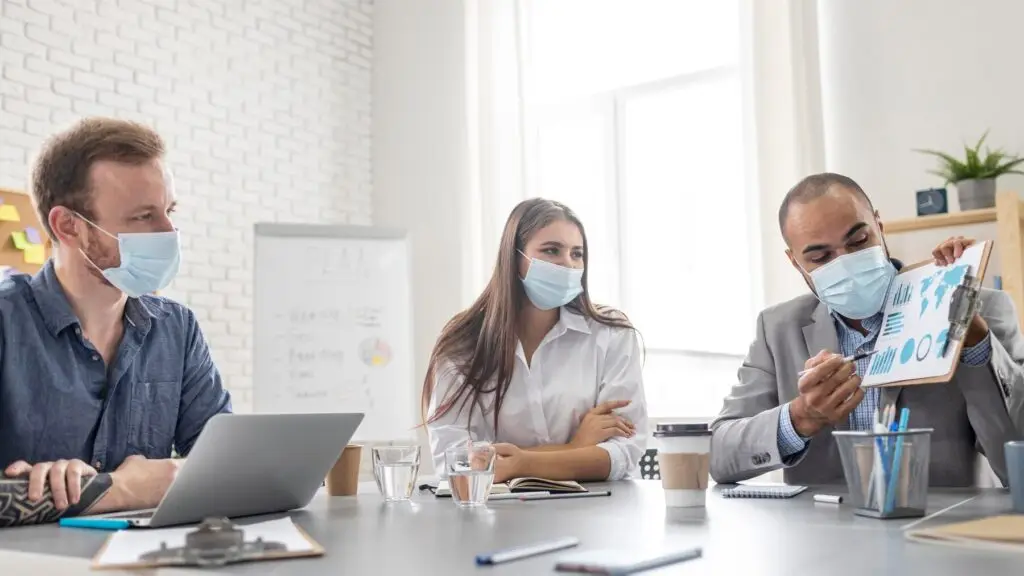 business people discussing patient demographics