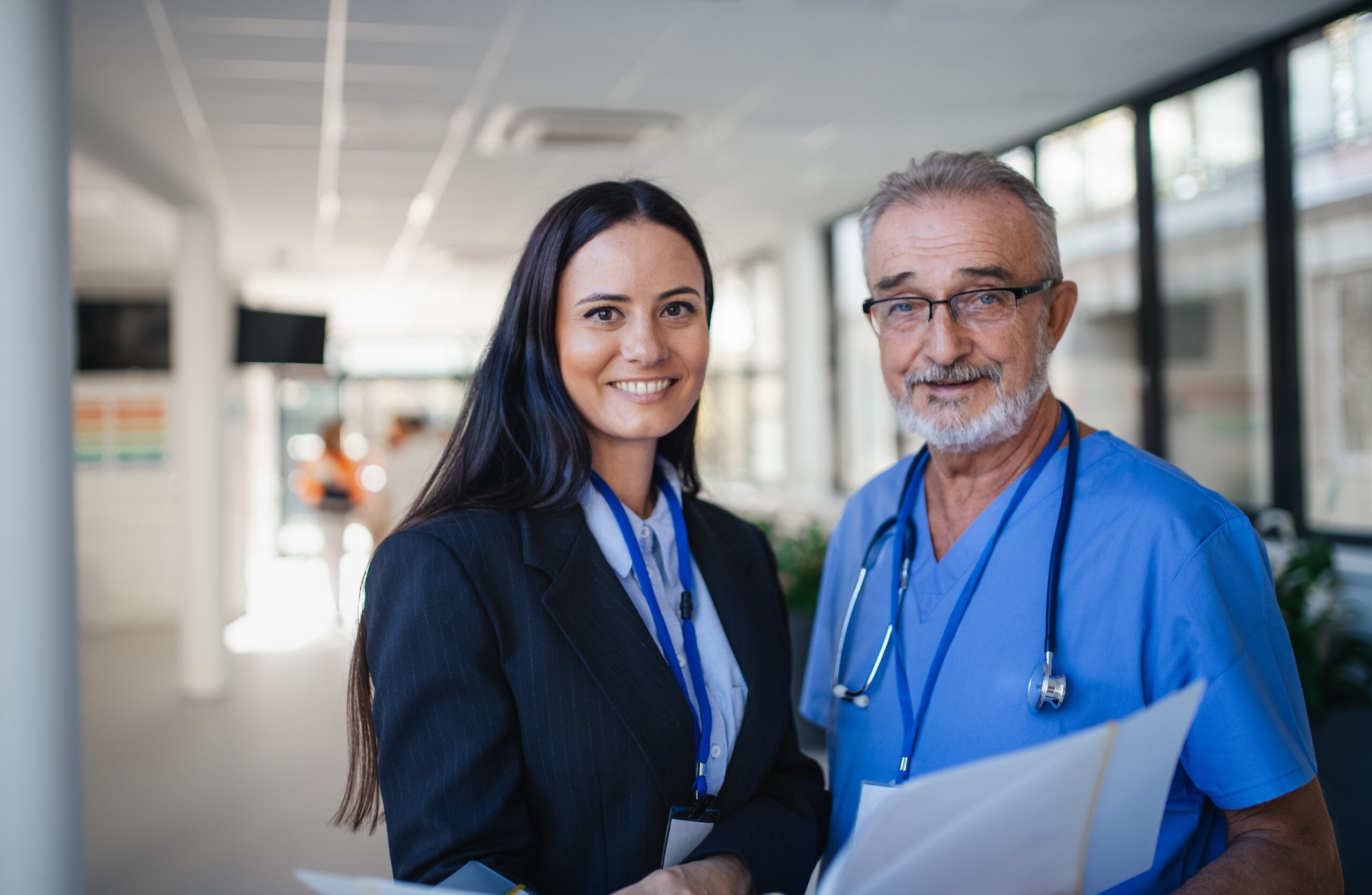 trusted by 1000+ healthcare providers, hospital director smiling with doctor scaled