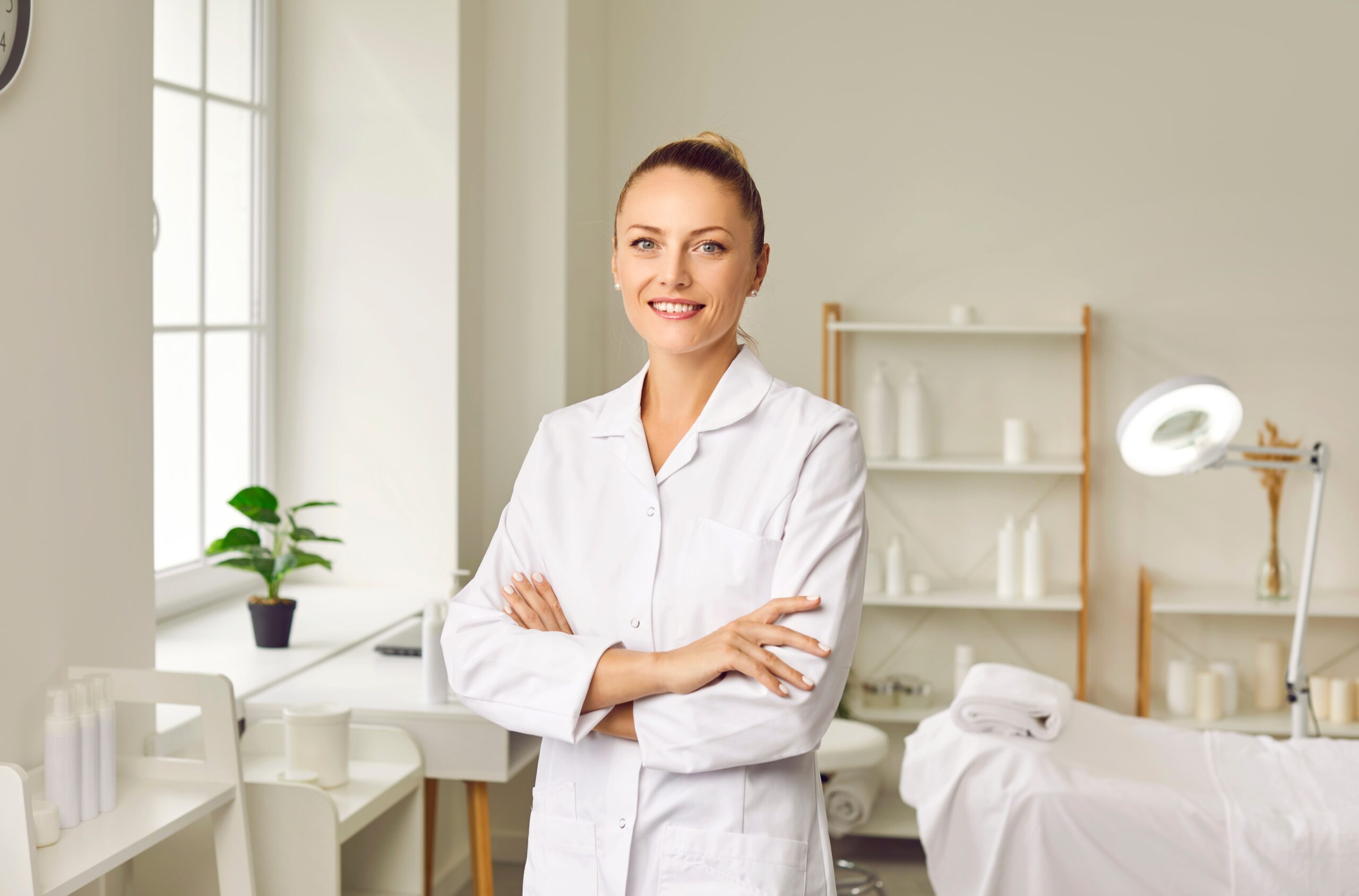 our medical spa compliance services, medical spa owner smiling scaled